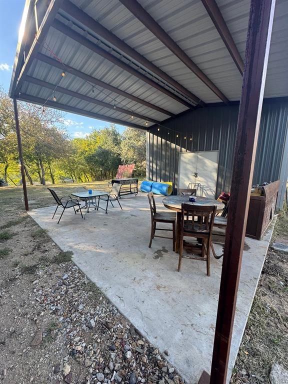 1021 Riverview Road Millsap, TX 76066 - Photo 9 of 26 View of patio with outdoor dining space