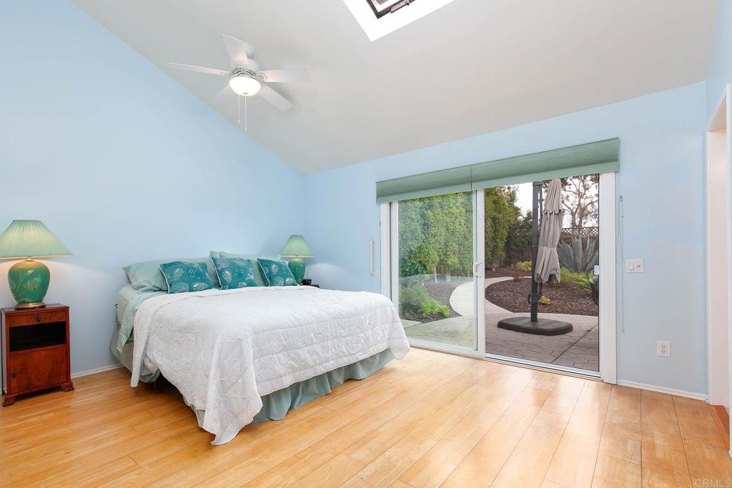 747 Santa Victoria Solana Beach, CA 92075 - Photo 25 of 57 a bedroom with a bed and a large window with outer view