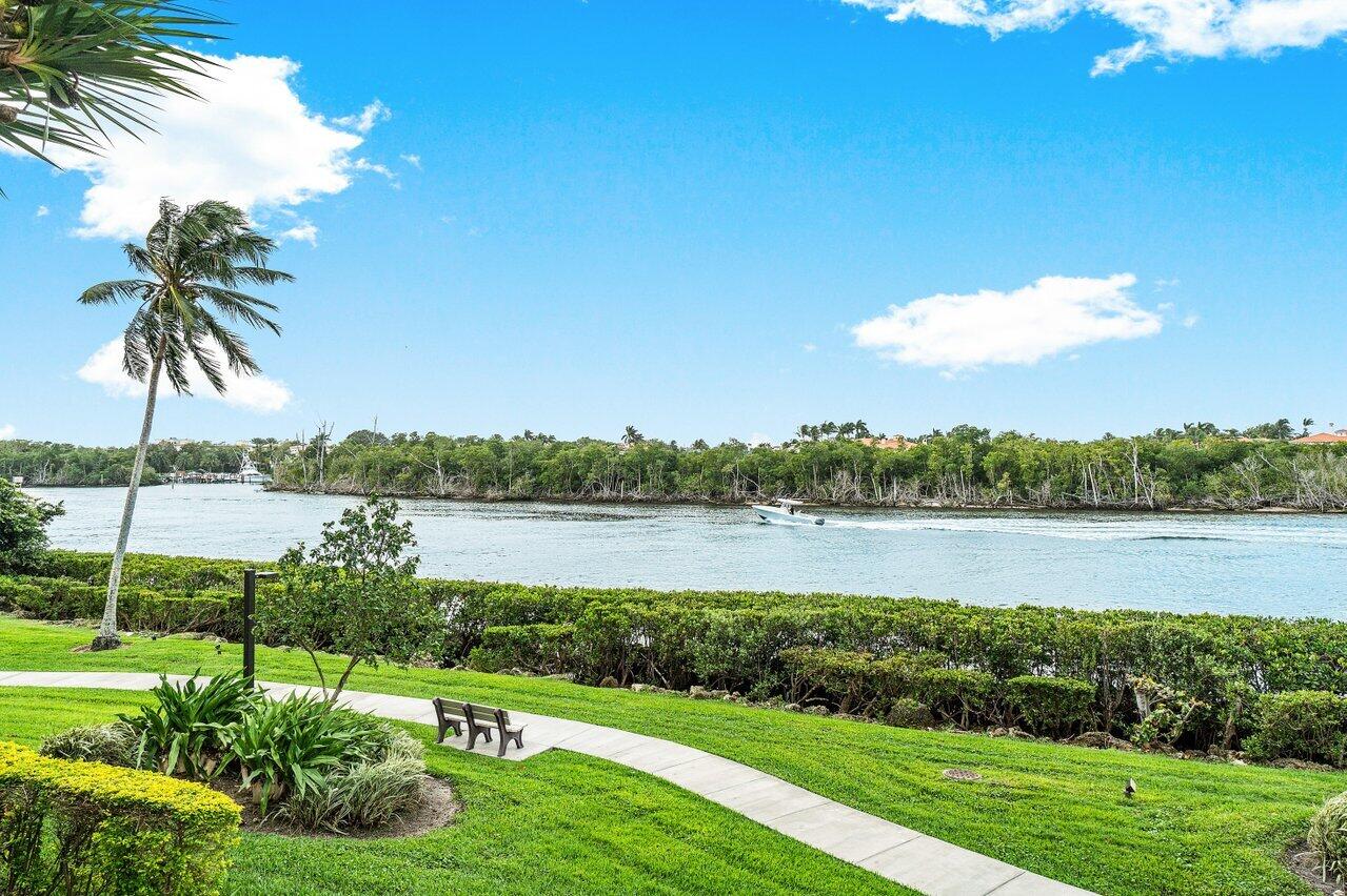 4201 North Ocean Boulevard, Unit 1801 Boca Raton, FL 33431 - Photo 44 of 48 a view of a lake with a big yard