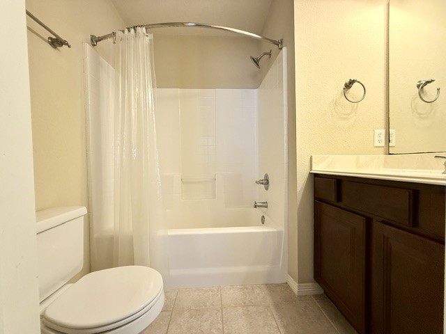 1000 Spring Loop, Unit 1806 College Station, TX 77840 - Photo 20 of 33 a bathroom with a sink a toilet and shower