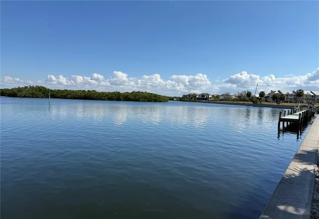 a view of an ocean with boats