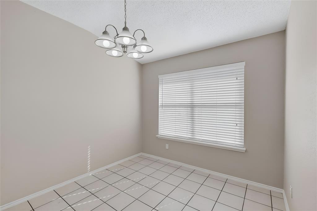 1207 Aberdeen Drive Allen, TX 75002 - Photo 17 of 40 a view of an empty room with a window