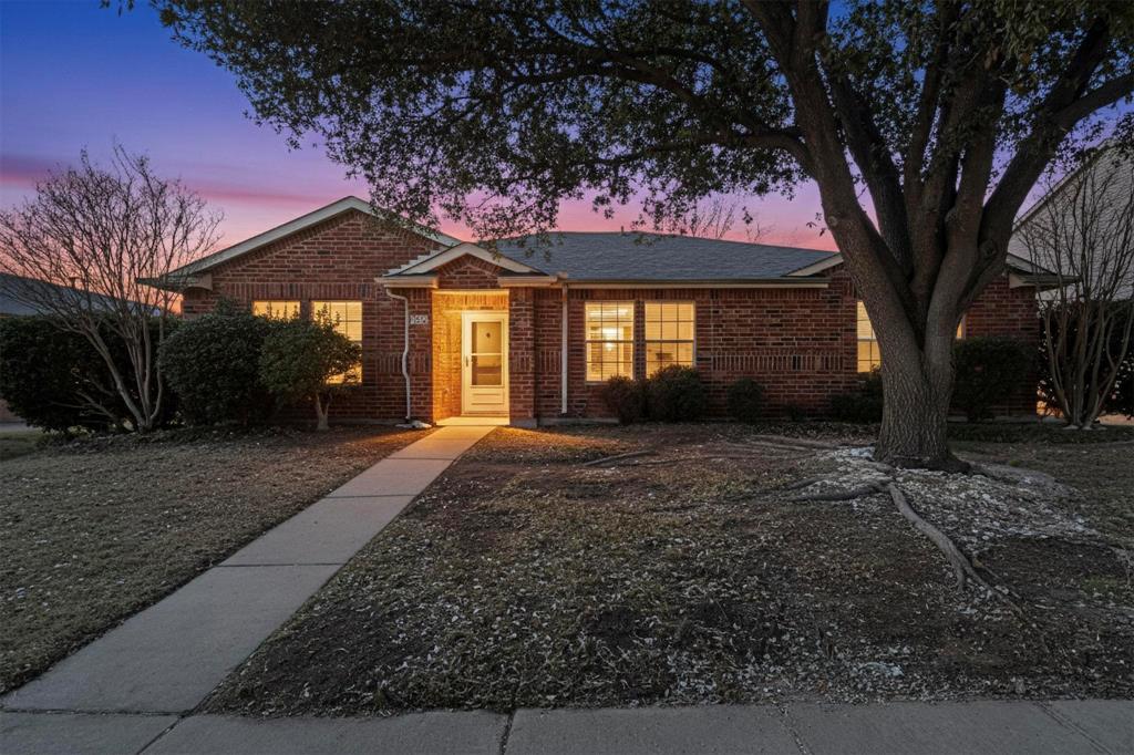 1207 Aberdeen Drive Allen, TX 75002 - Photo 3 of 40 a view of a house with a yard