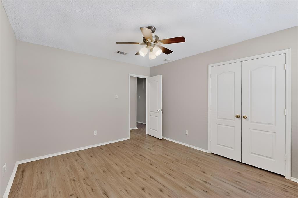 1207 Aberdeen Drive Allen, TX 75002 - Photo 35 of 40 a view of an empty room and wooden floor