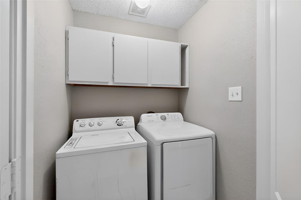 1207 Aberdeen Drive Allen, TX 75002 - Photo 37 of 40 a utility room with dryer and washer