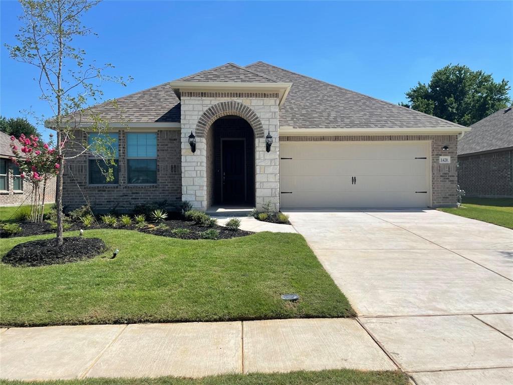 1420 Elizabeth Street Anna, TX 75409 - Photo 1 of 18 a front view of a house with a yard
