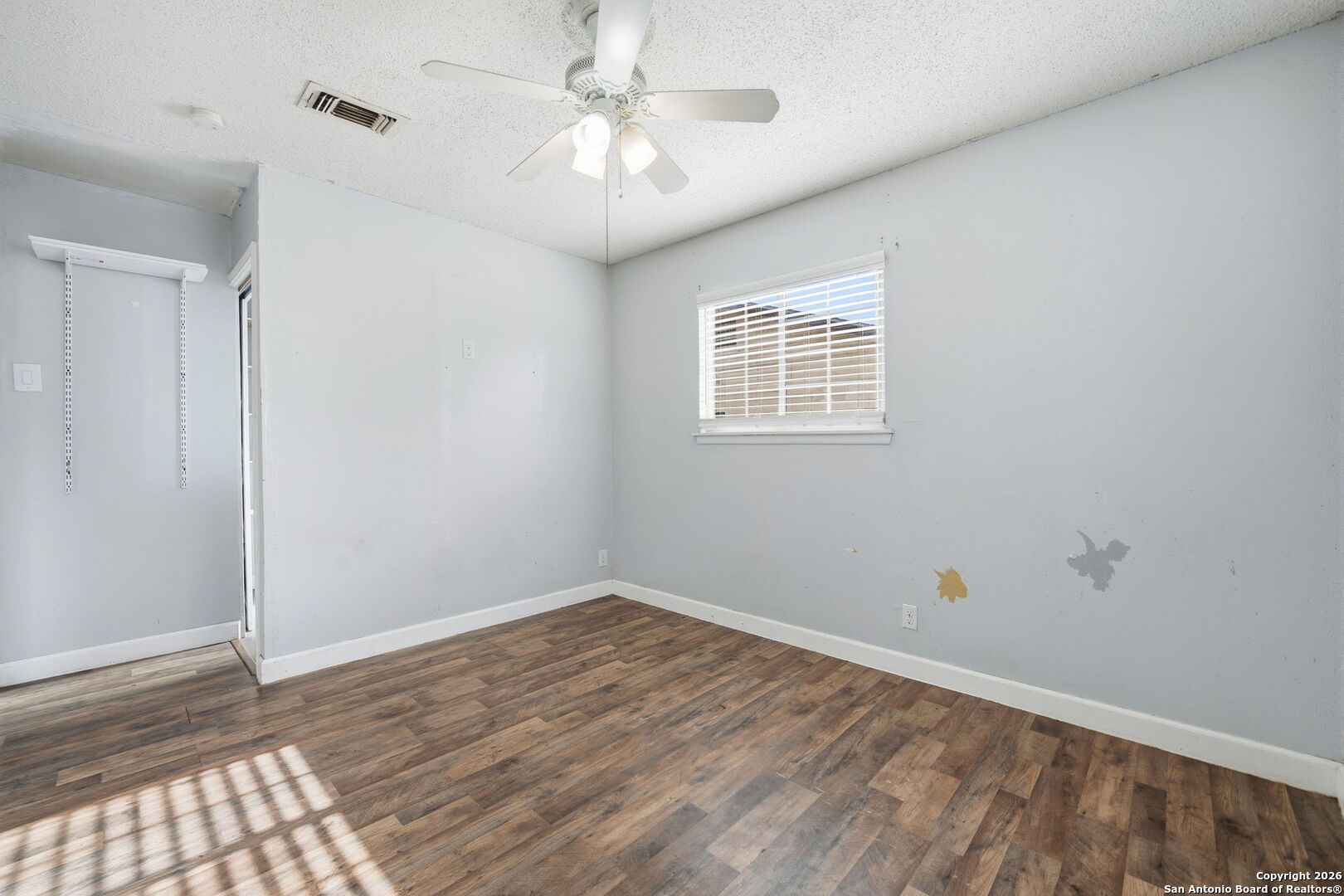 126 Meadow Way Converse, TX 78109 - Photo 17 of 33 a view of an empty room with a window