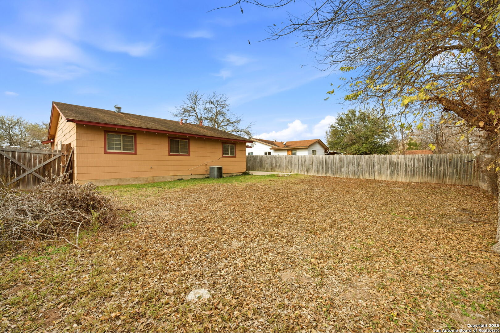 126 Meadow Way Converse, TX 78109 - Photo 31 of 33 a front view of a house with a yard
