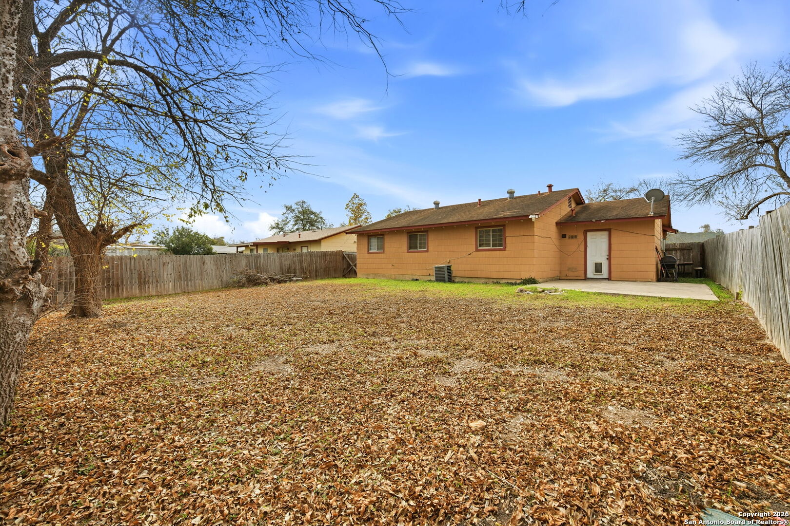 126 Meadow Way Converse, TX 78109 - Photo 32 of 33 a front view of a house with a yard