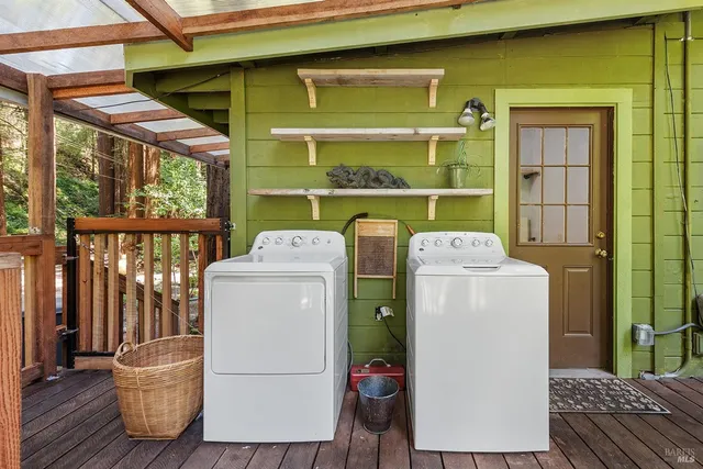 a view of a chairs on the roof deck