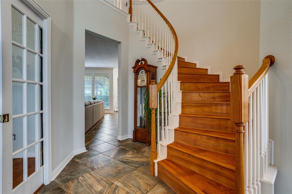 411 Wolverley Lane Allen, TX 75002 - Photo 13 of 27 a view of entryway and hall with wooden floor