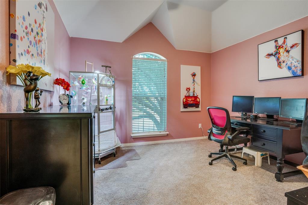 411 Wolverley Lane Allen, TX 75002 - Photo 22 of 27 a view of a workspace with furniture and a window
