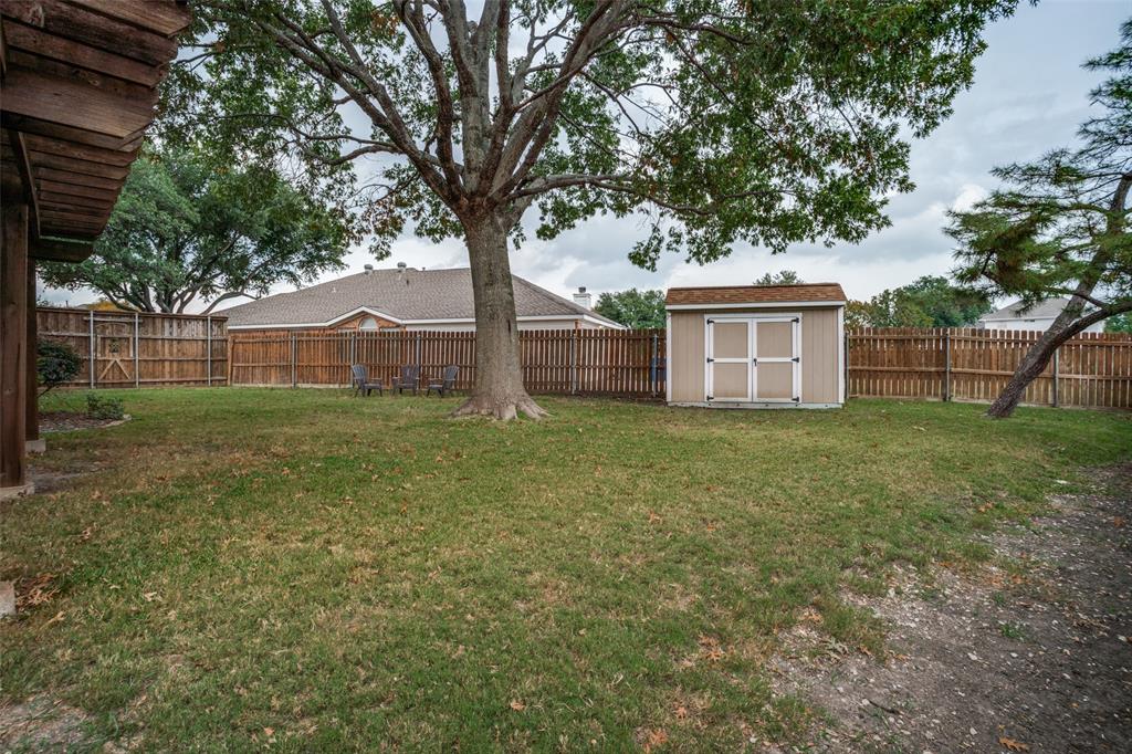 411 Wolverley Lane Allen, TX 75002 - Photo 25 of 27 a white house that has tree in front of it