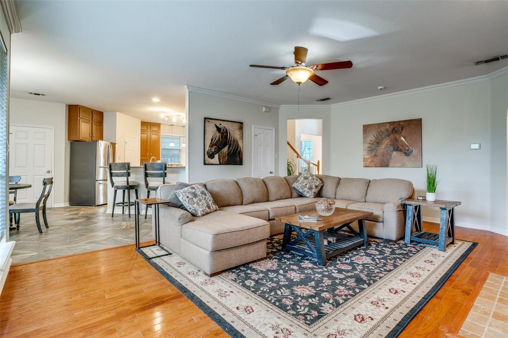 411 Wolverley Lane Allen, TX 75002 - Photo 9 of 27 a living room with furniture and a rug