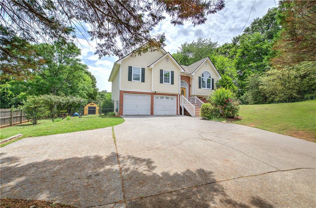 218 Gilreath Road Southeast Cartersville, GA 30121 - Photo 3 of 27 a house view with a outdoor space