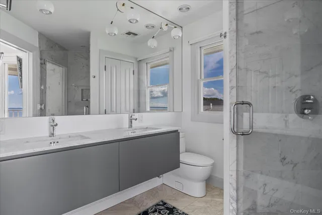 a front view of a house with a yard and fountain