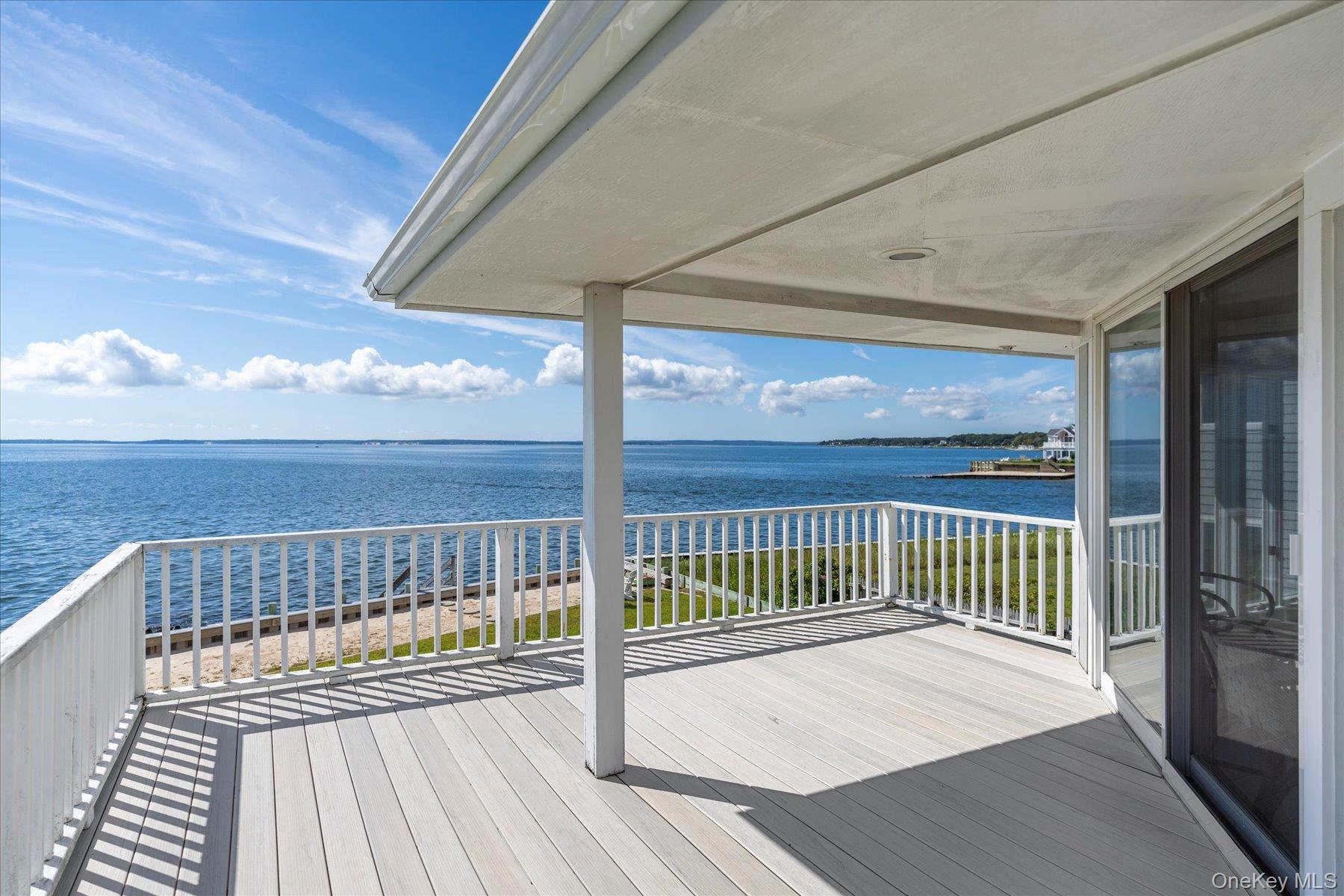 4415 Camp Mineola Road Mattituck, NY 11952 - Photo 30 of 44 Upper balcony with privacy and mesmerizing bay views.