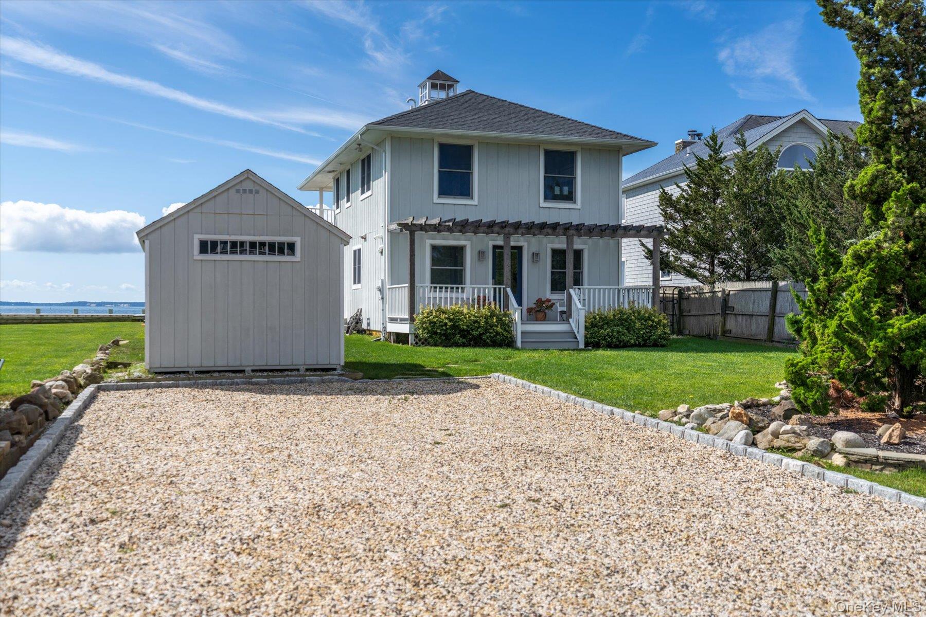 4415 Camp Mineola Road Mattituck, NY 11952 - Photo 34 of 44 Additional outbuilding space for storage and to enjoy the surrounding waterfront setting.