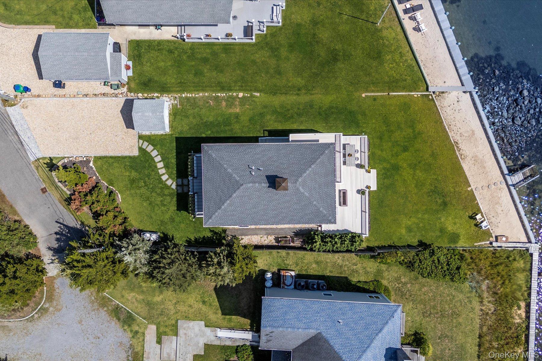 4415 Camp Mineola Road Mattituck, NY 11952 - Photo 35 of 44 Open design enhances natural light and indoor-outdoor connection.