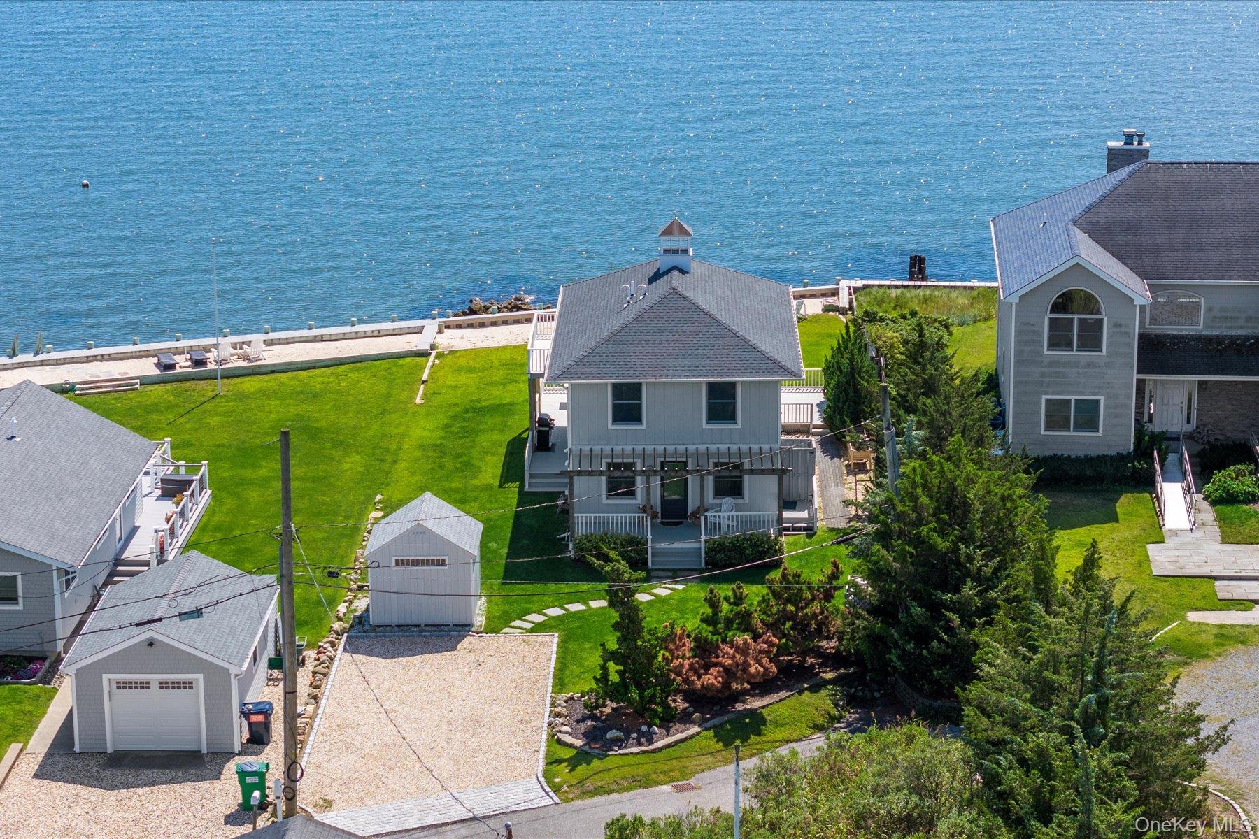 4415 Camp Mineola Road Mattituck, NY 11952 - Photo 38 of 44 Newly improved driveway providing convenient off street parking.