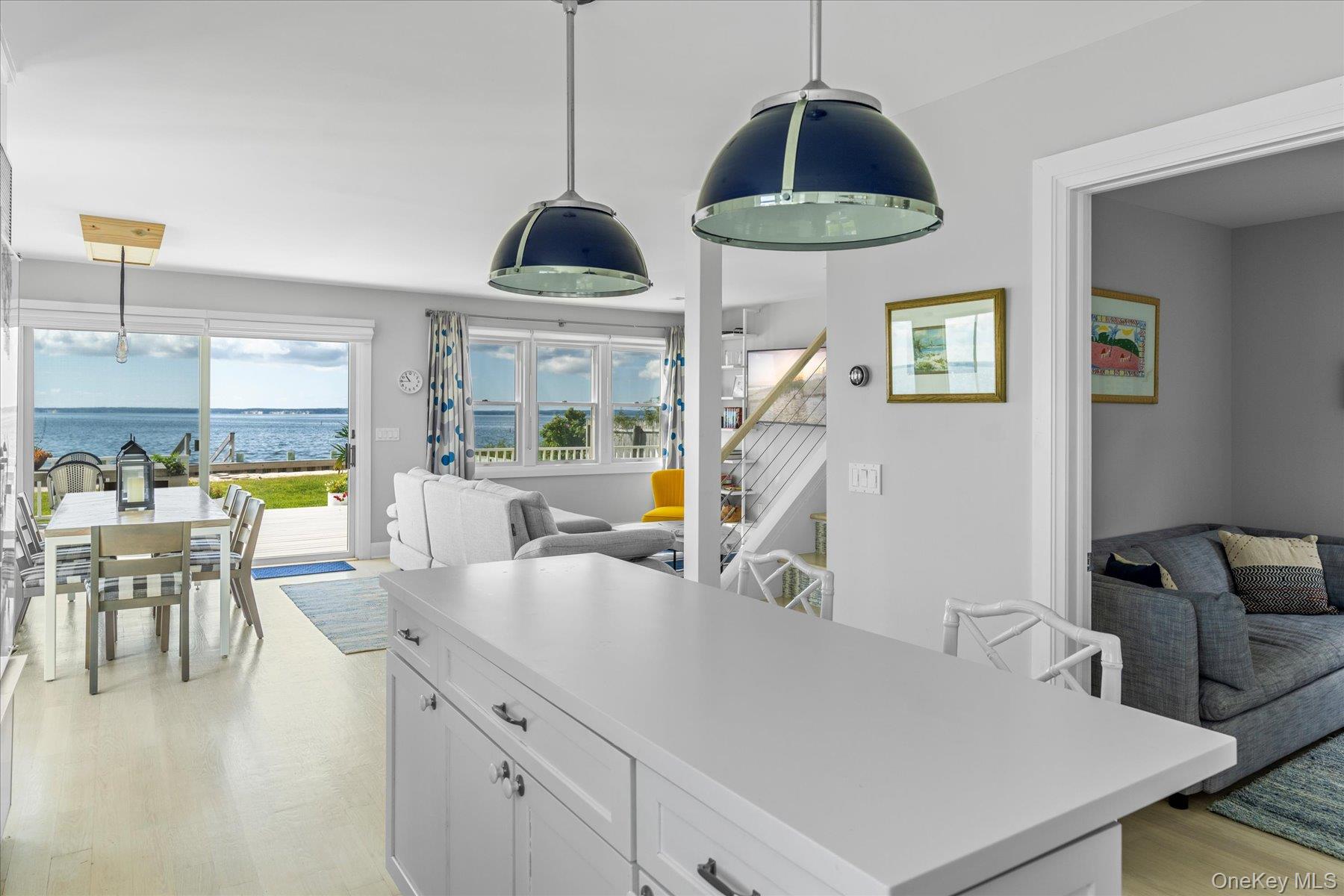 4415 Camp Mineola Road Mattituck, NY 11952 - Photo 7 of 44 Spacious island with breakfast bar seating, ideal for casual dining and entertaining.