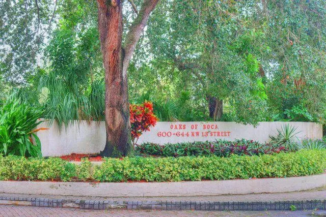 a view of a parked cars in front of a building
