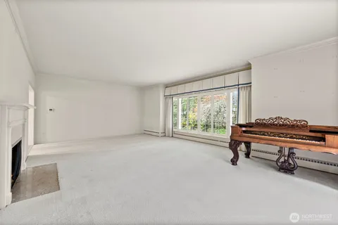 a room with a bed and a window