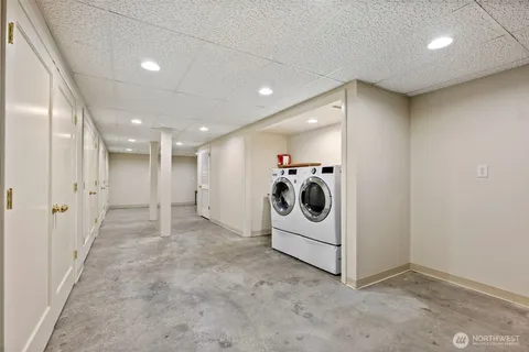 a view of a storage & utility room with washer and dryer