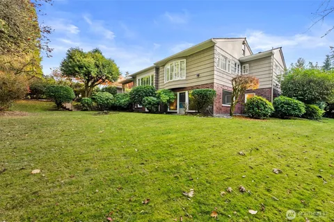 a view of a building with a yard