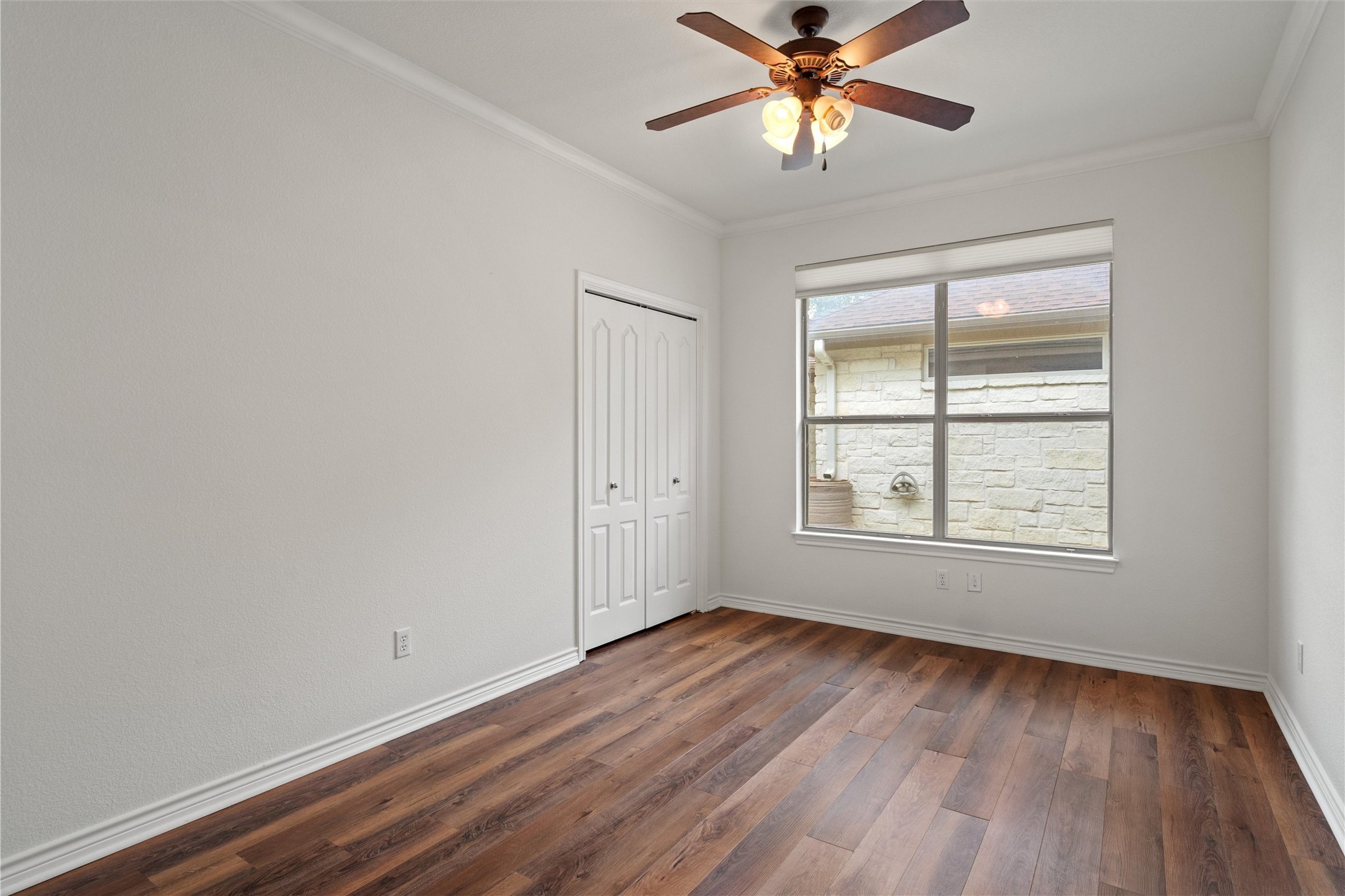 4612 Sonora Trace Georgetown, TX 78633 - Photo 11 of 36 wooden floor in an empty room with a window