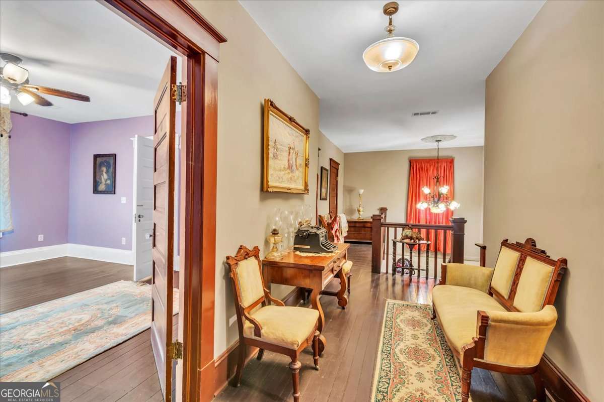 212 East Union Street Vienna, GA 31092 - Photo 41 of 62 a view of a dining room with furniture and chandelier