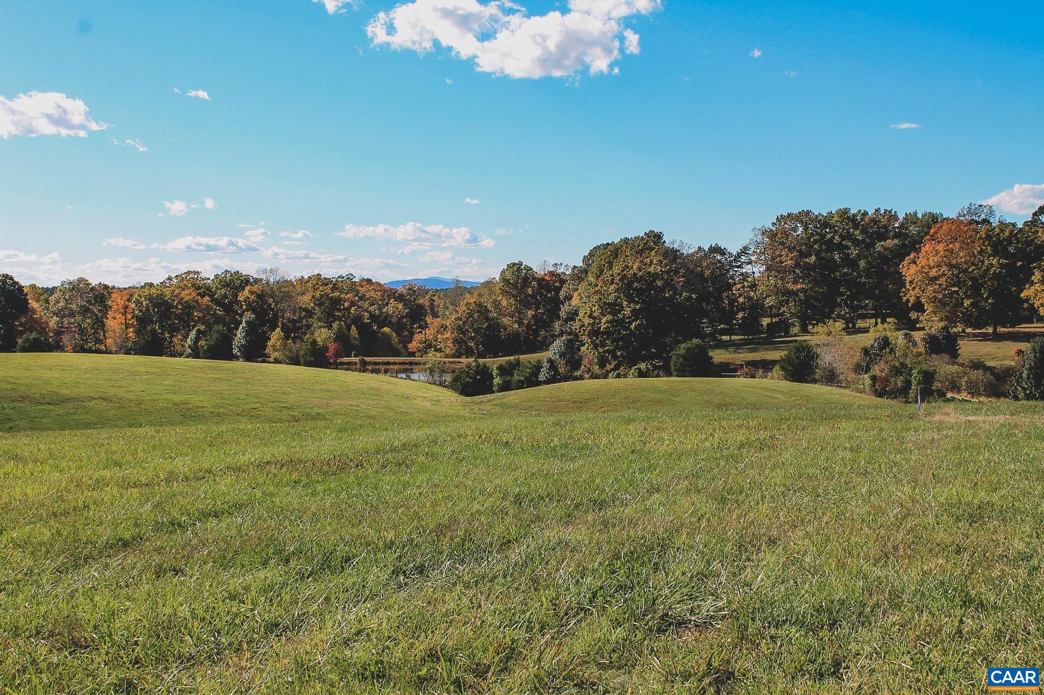 Lot 21 Rolling Road Scottsville, VA 24590 - Photo 19 of 24 a view of a green field with clear sky