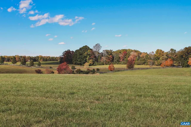 a view of an ocean and a mountain