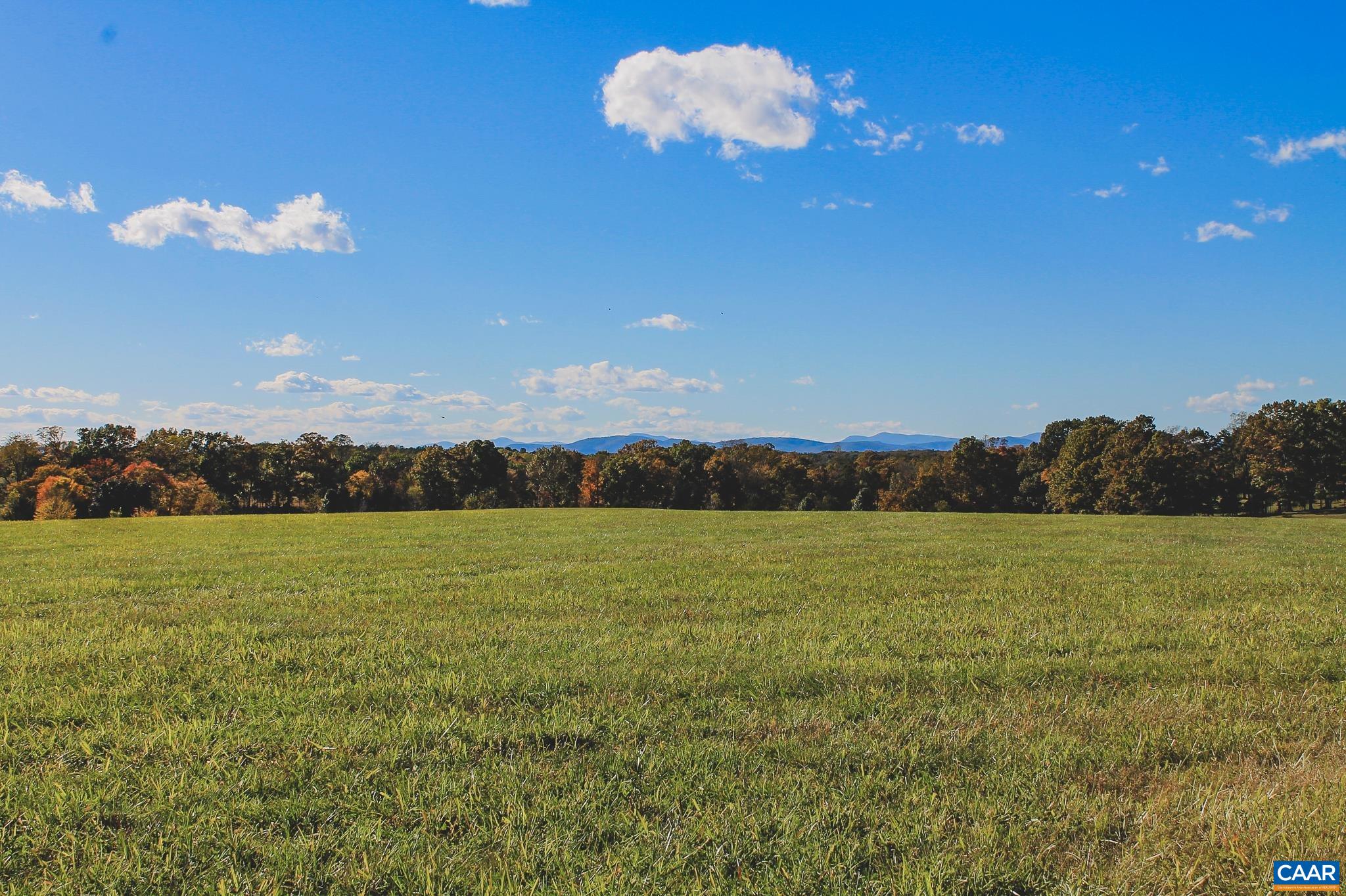 Lot 21 Rolling Road Scottsville, VA 24590 - Photo 22 of 24 a view of an ocean and a mountain