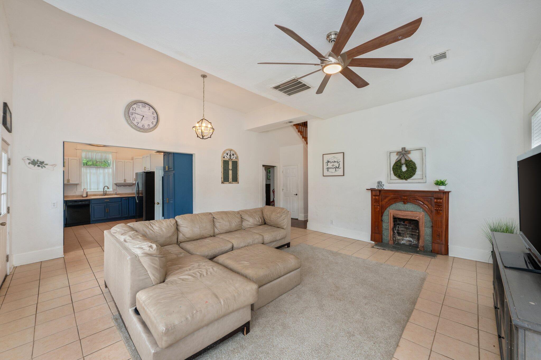 938 5th Street Florala, AL 36442 - Photo 11 of 65 a living room with furniture and a fireplace