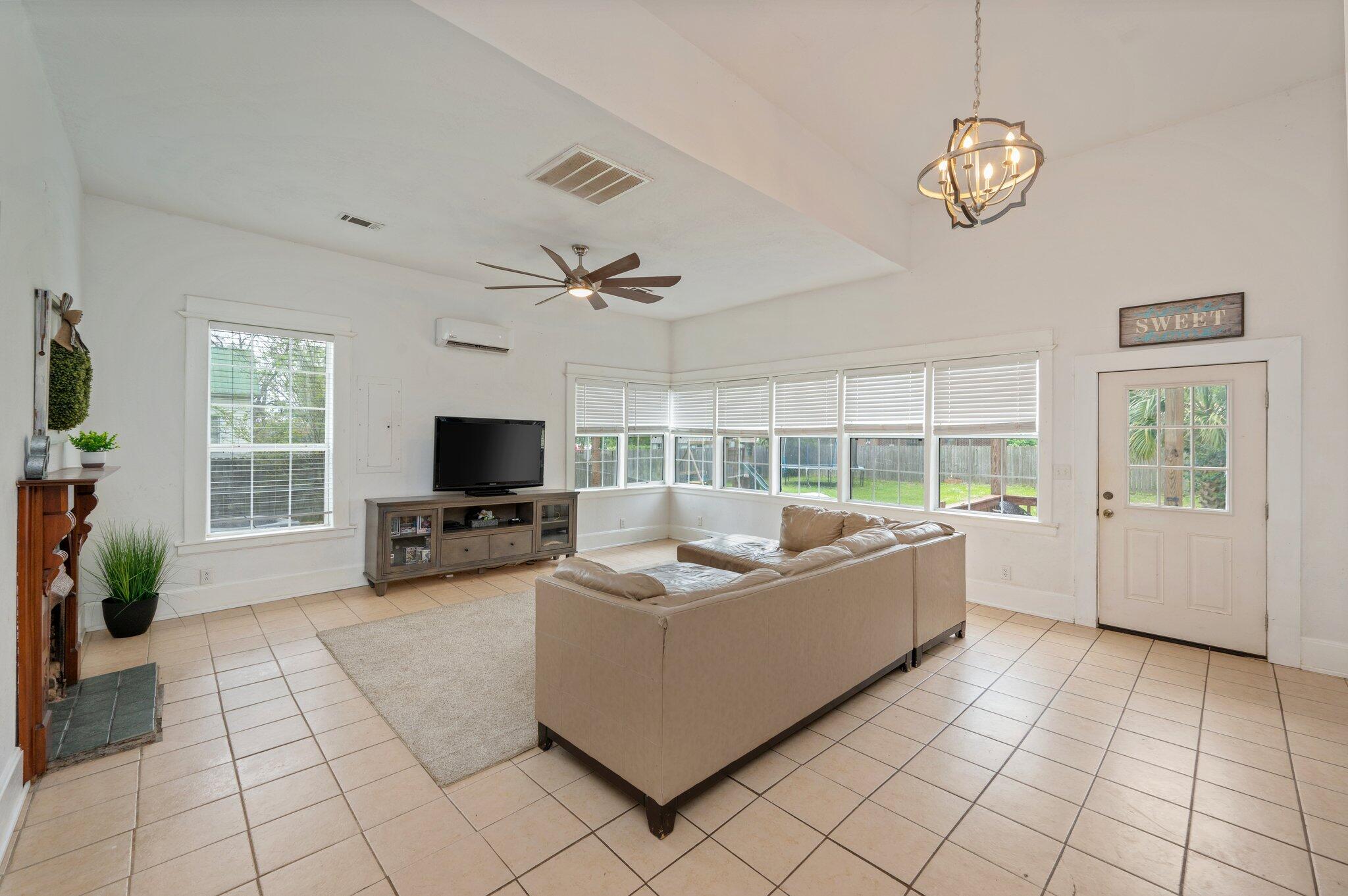 938 5th Street Florala, AL 36442 - Photo 13 of 65 a living room with furniture and a flat screen tv
