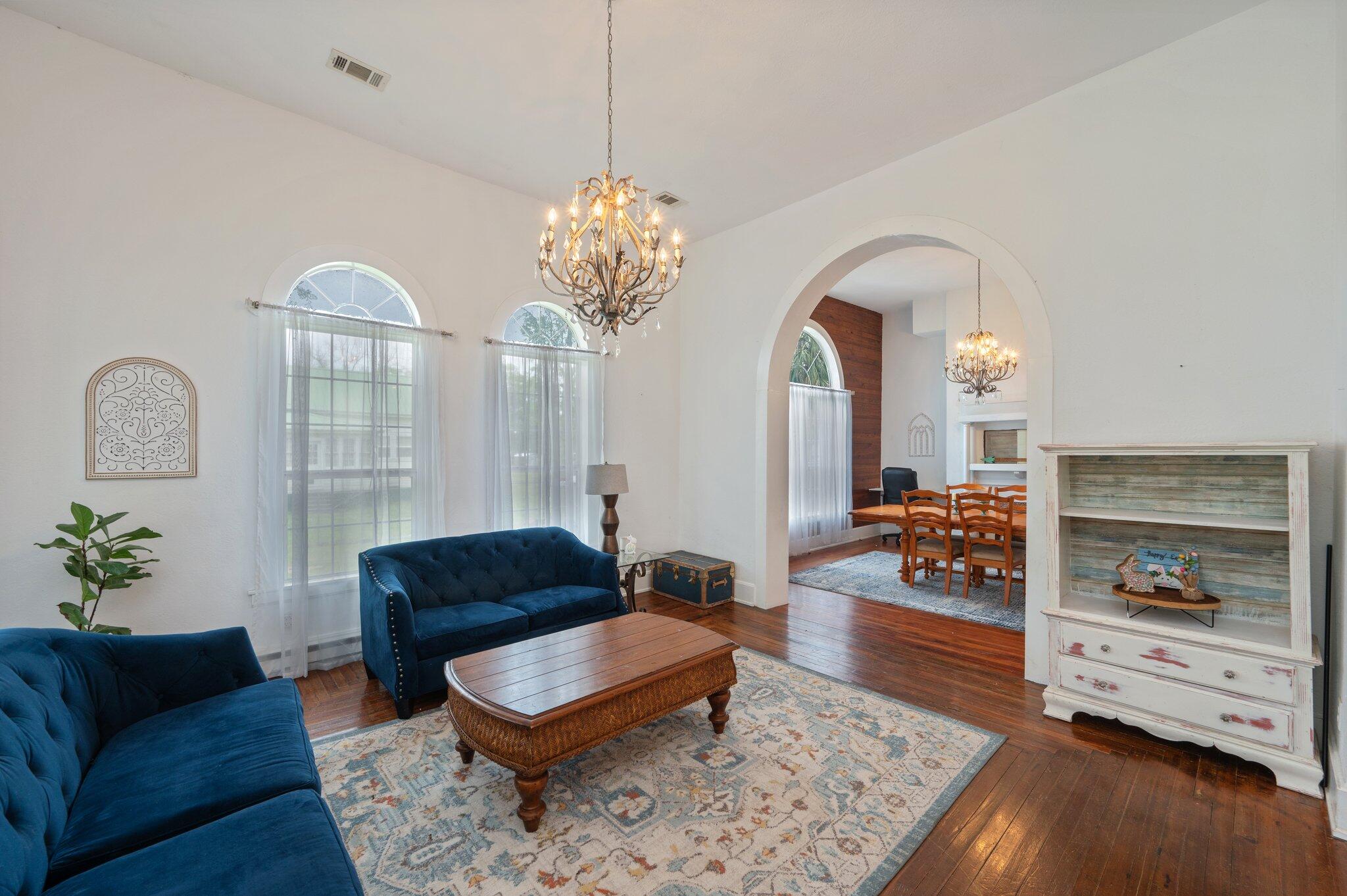 938 5th Street Florala, AL 36442 - Photo 16 of 65 a living room with furniture chandelier and a table