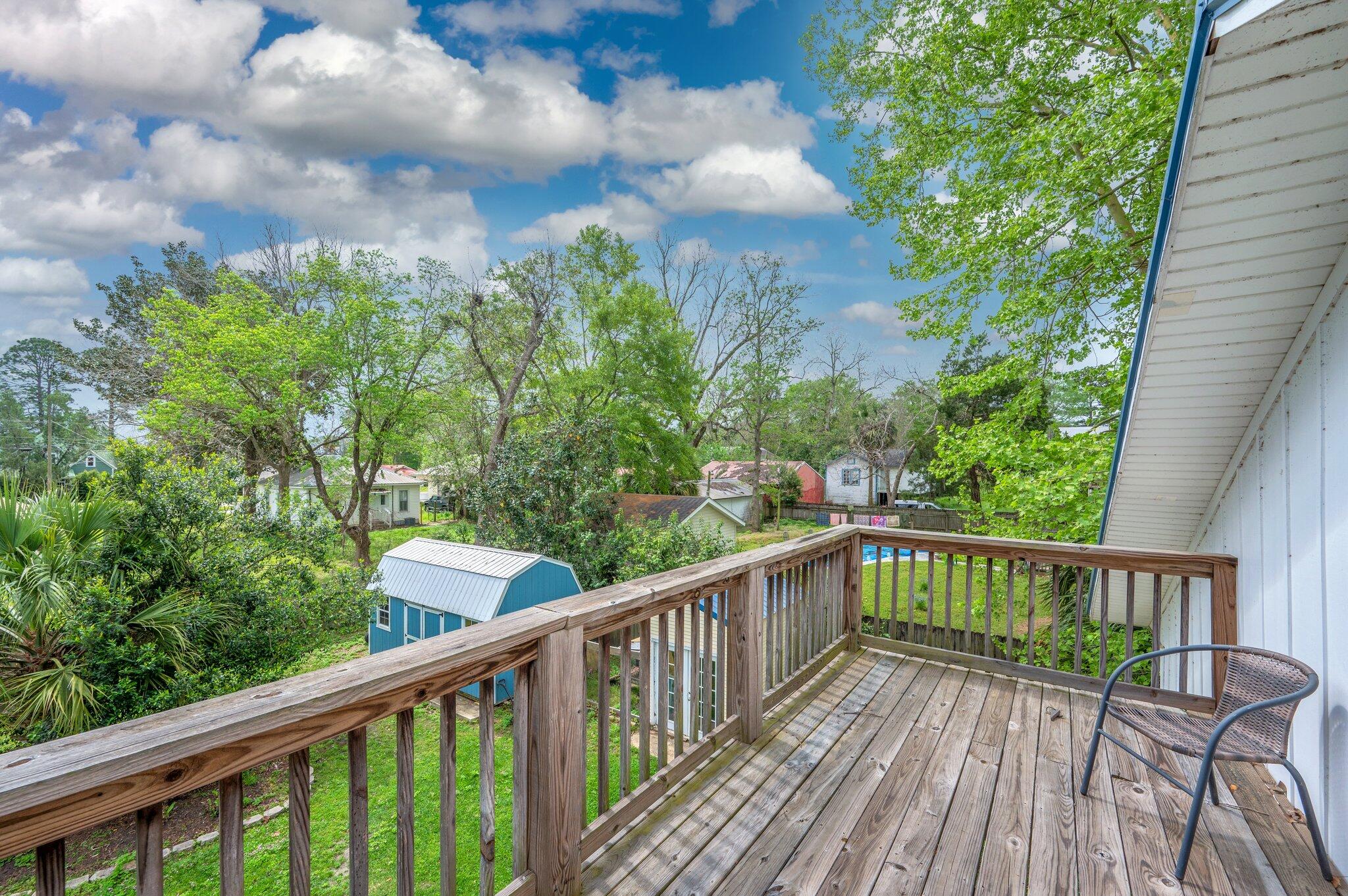 938 5th Street Florala, AL 36442 - Photo 46 of 65 a view of a balcony with wooden floor