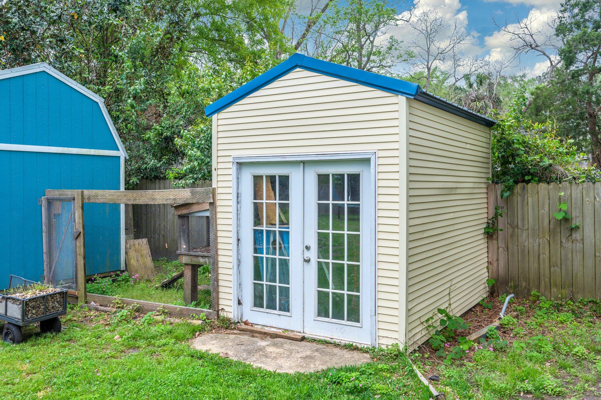938 5th Street Florala, AL 36442 - Photo 54 of 65 a view of backyard with a garden and plants