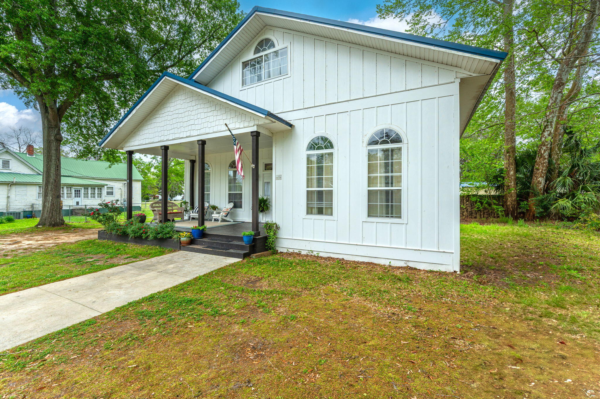 938 5th Street Florala, AL 36442 - Photo 61 of 65 front view of a house with a yard