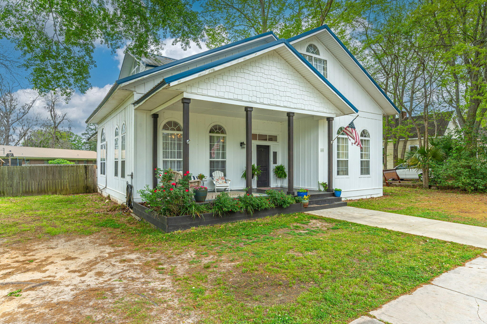 938 5th Street Florala, AL 36442 - Photo 62 of 65 a view of a house with a yard