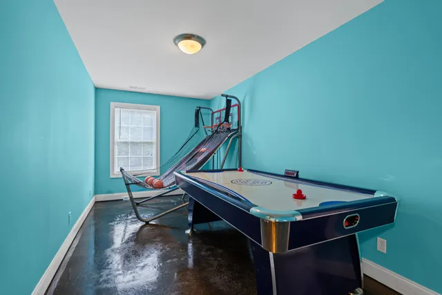 a view of a balcony with wooden floor