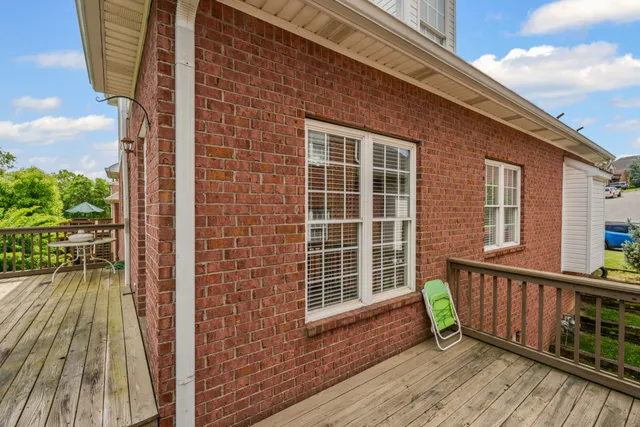 a view of a patio with swimming pool
