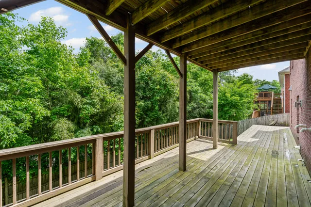 a view of a swimming pool with a lounge chairs
