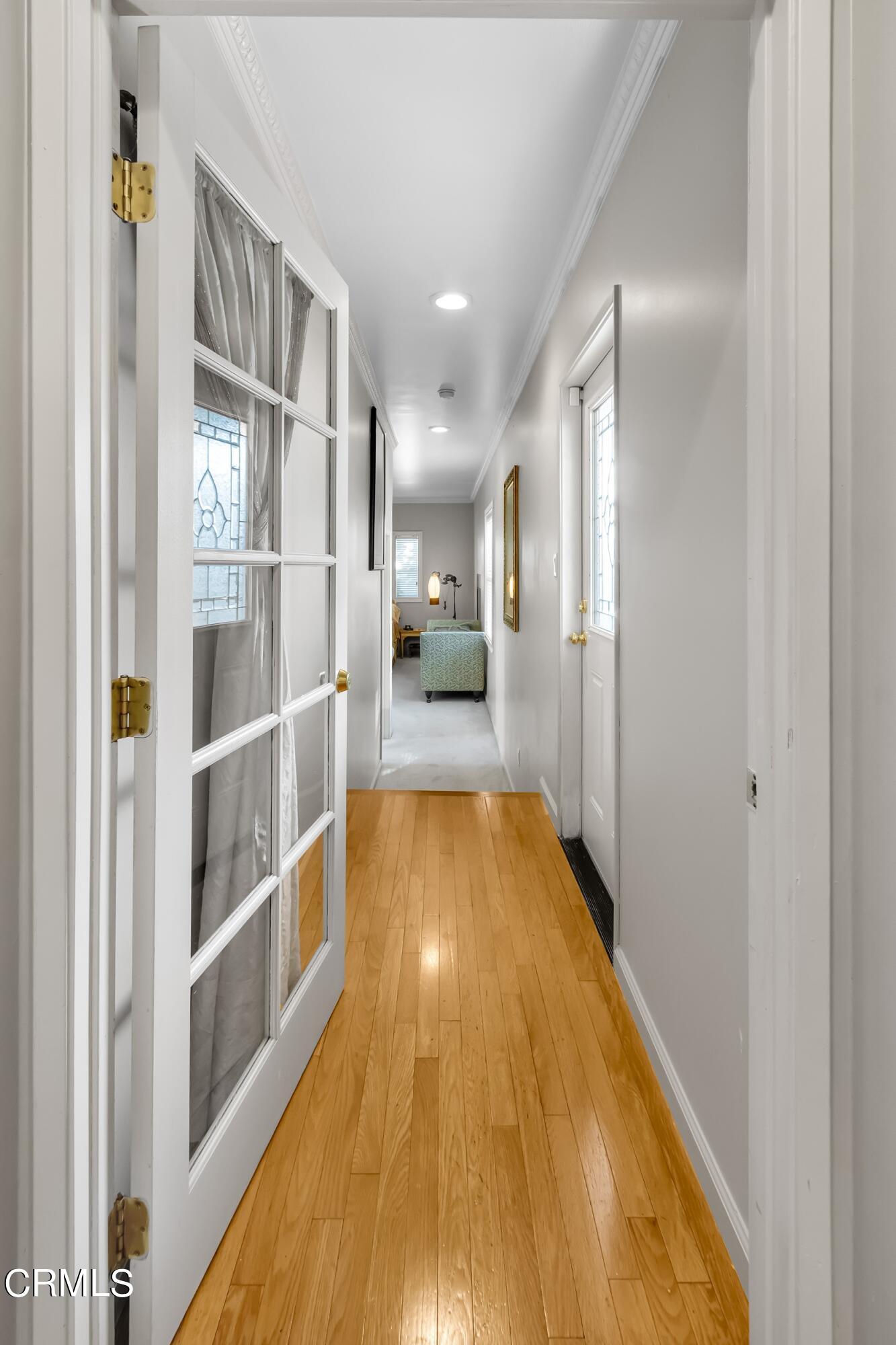 432 West Poppyfields Drive Altadena, CA 91001 - Photo 11 of 23 a view of gallery with wooden floor