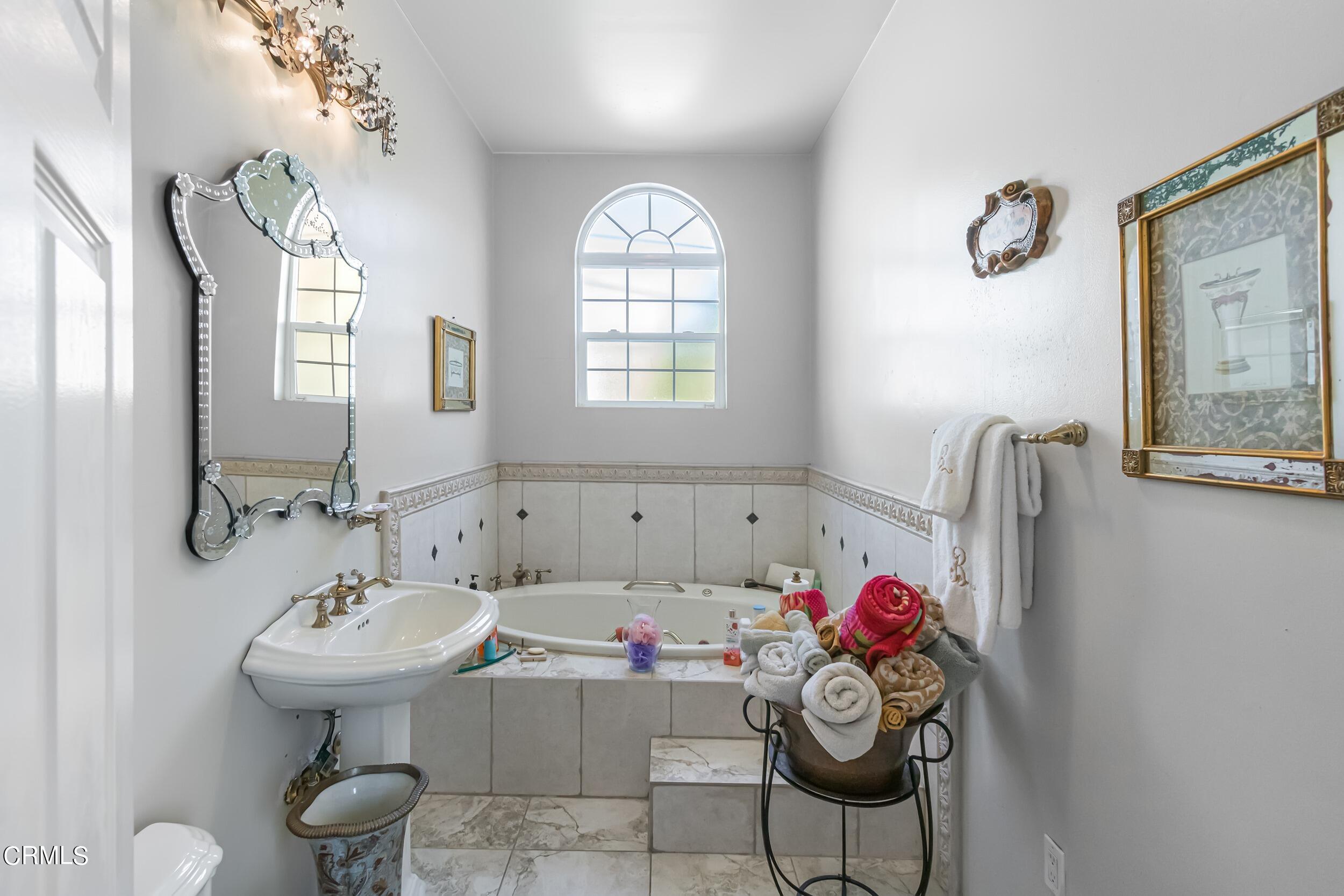 432 West Poppyfields Drive Altadena, CA 91001 - Photo 14 of 23 a bathroom with a sink mirror and toilet