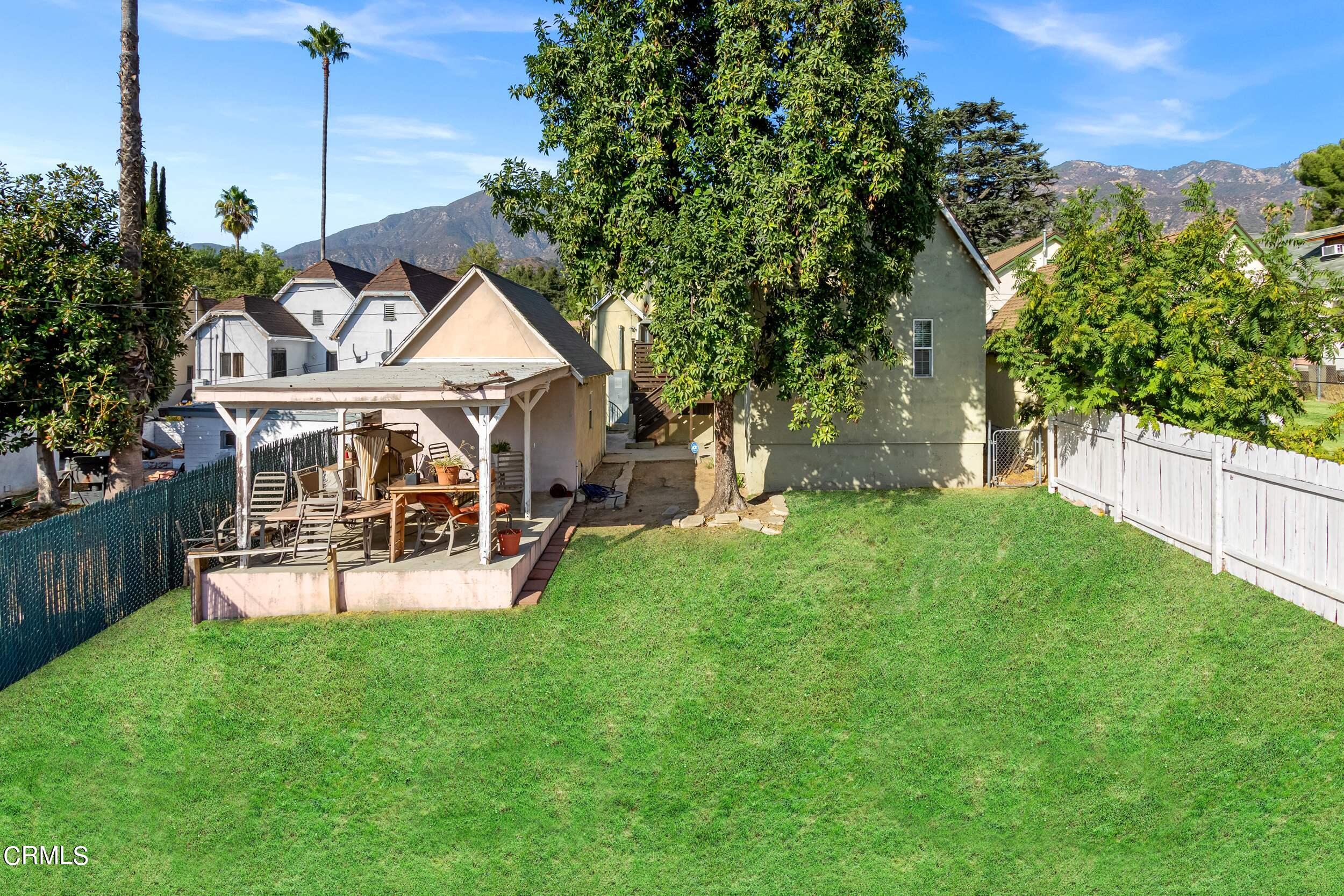 432 West Poppyfields Drive Altadena, CA 91001 - Photo 19 of 23 a view of a house with a yard porch and sitting area