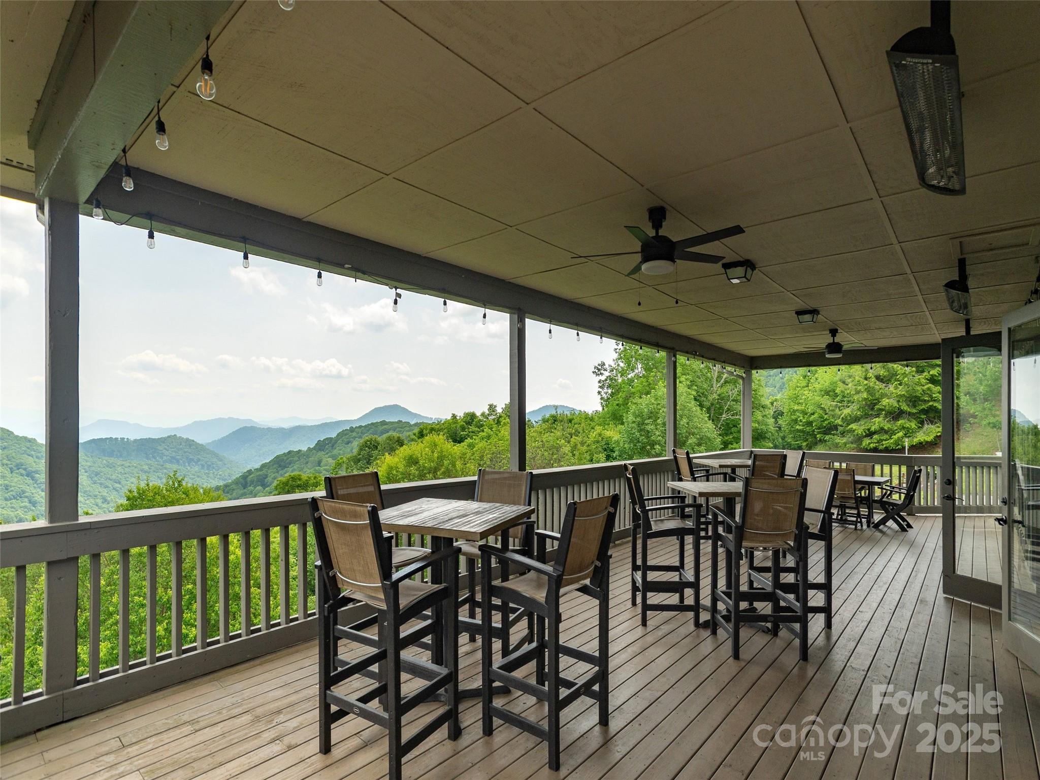 0 English Ridge Drive, Unit 34 Mars Hill, NC 28754 - Photo 7 of 32 a view of a dining room with furniture window and outside view