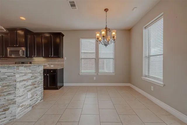 a view of livingroom with kitchen