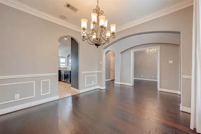 a view of a livingroom with wooden floor